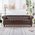 Divano Chesterfield a 3 posti in finta pelle con braccioli arrotolati